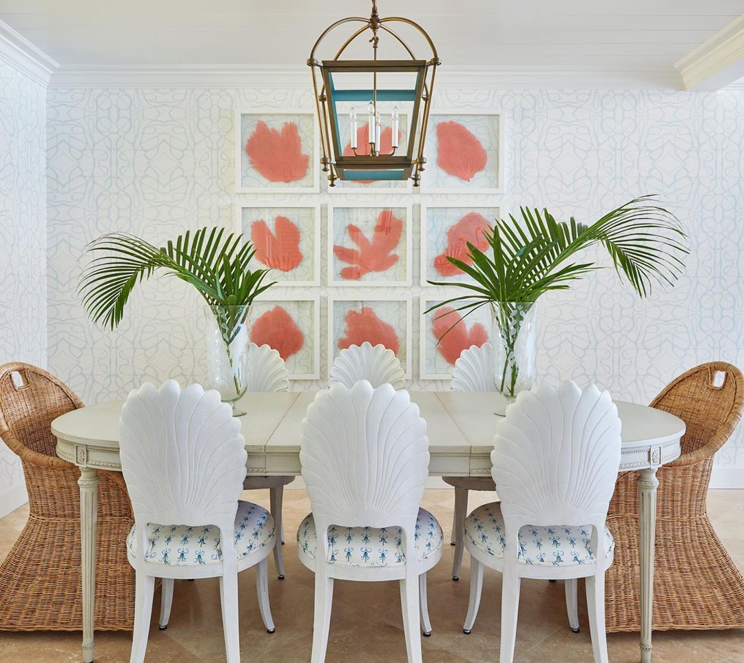 Coastal-dining-room-with-shell-chairs-and-coral-art-via-@ellenkavanaugh