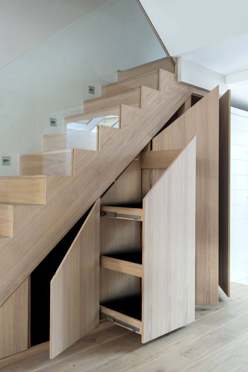 Under-the-stairs-cabinets-with-shelves-for-shoes-via-barnes-design
